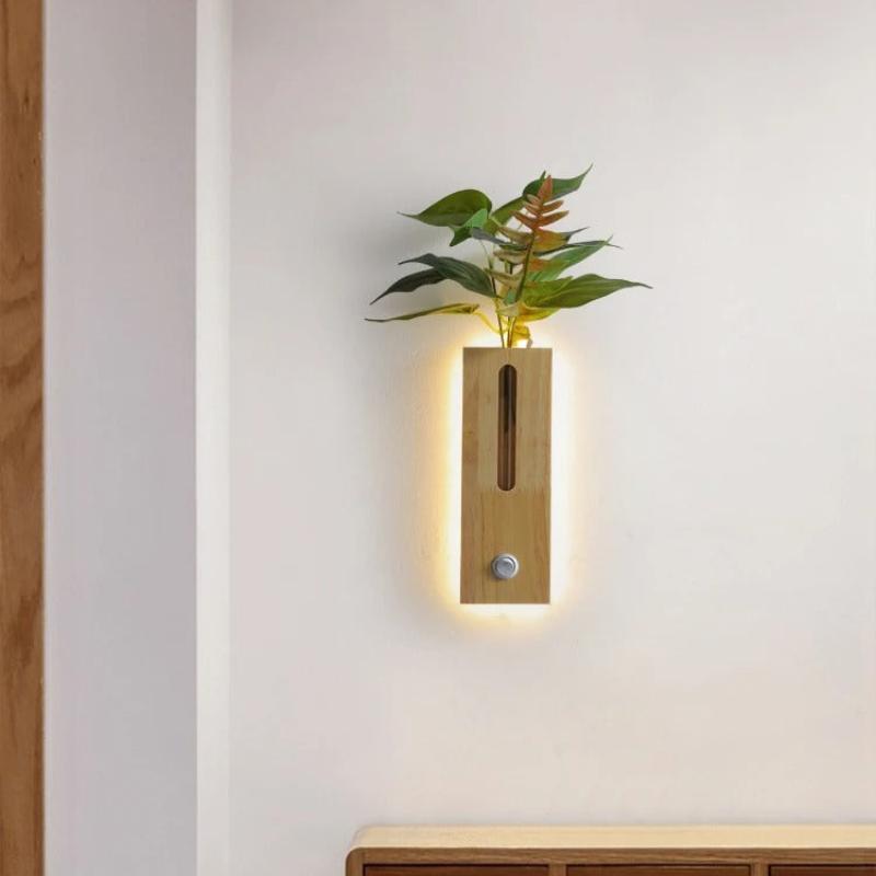 applique murale en bois naturel avec plante